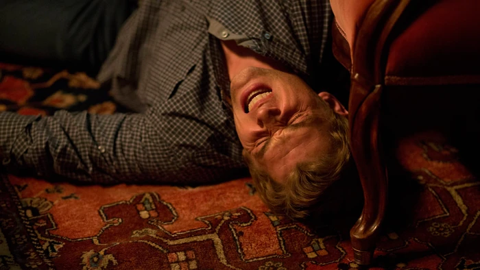...but Dylan was ready for him. Shelby takes a bullet to the leg and goes down, dropping his gun in the process.