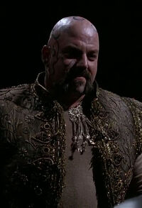 Rick Zumwalt (1951–2001), as Tattooed Strongman (Batman Returns)