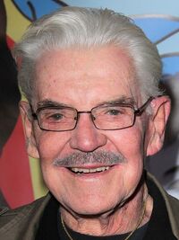 Jack Betts (1944–2025), TV Fisherman (Batman Forever) and Party Guest #1 (Batman & Robin)