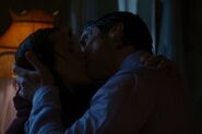 TDKR Miranda and Bruce kiss