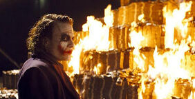 Joker burns money