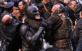 Bane-Batman in a headlock