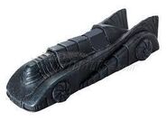 A Hotwheels toy of the Batmobile in Cocoon mode