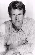 An autographed photo of Kevin Conroy.