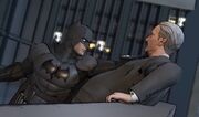 Batman questions Hill about his association with the Penguin