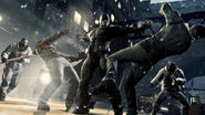 Batman taking down thugs.