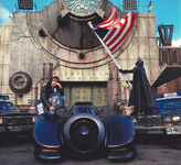 Anton Furst and Carl Newman in the batsuit, waving the American flag.