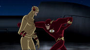 The Justice Lord Flash android, being defeated by Flash.