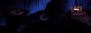 A view of the Batcave from Batman Beyond. The Batmobile from The New Batman Adventures can be glimpsed to the far left, though it seems to have a different front grill.