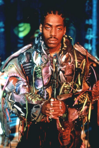Coolio (1963–2022), as "Banker" (Batman & Robin)
