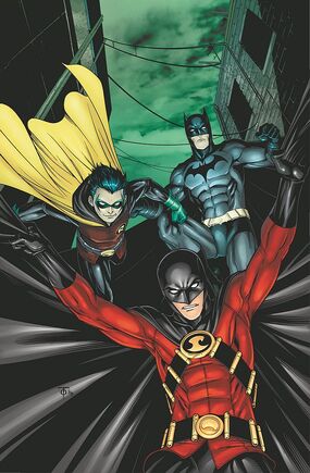 Tim as Red Robin, fighting alongside the new Robin (Damian Wayne) and Batman (Dick Grayson).