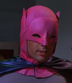 's cowl turns hot pink after the  sprays it
