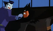 Joker fistfighting Batman