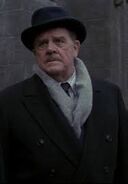 Pat Hingle as Commissioner Gordon