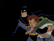 Batman deactivating disguise mode on the Batmobile via a voice-activated wrist device