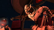 Grievous smacks a annoying driver droid's head off.