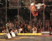 T-Minus throws Sunshine Lollibot into the air.