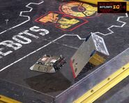 Falcon15 flipping an opponent over during the 2005 BattleBots IQ event.