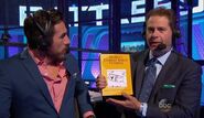 Chris and Kenny present Team RioBotz's robotics book.