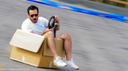 Kenny Florian driving a cardboard box during the 2018 season.