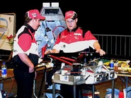 Ti2-wyachi.jpg (74 KB) Terry and another teammate check on Whyachi.