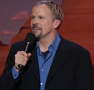 Bil Dwyer performing stand-up in the mid-2000s.