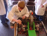 D-Monic BBIQ 2003 team.jpg (61 KB) D-Monic being worked on during BattleBots IQ 2003.