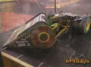 Diesector battles Atomic Wedgie near the spikestrip.