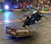 Spinister gets tossed by HexaDecimator.