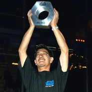Grant Imahara hoisting the Giant Nut in 1999.