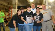 Team Jag are presented with their second place trophy for the High School Small Class.