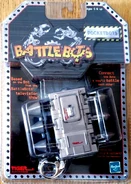 The toy sealed in its packaging.