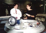 Team member talking with faculty advisor Doug Jussaume during construction.