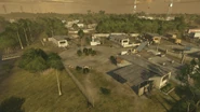 The two trailers opposite the roundabout