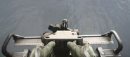 Mounted M134 minigun aboard the side of a Huey in Battlefield 3