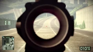 Aiming through the 4X Rifle Scope.