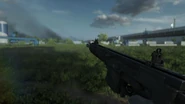 Inspecting the weapon