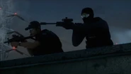 A Law Enforcement Professional with a Scout Elite next to a Mechanic with an MP5K.