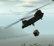 An ACH-47 towing an Air Cav Crate