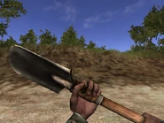 Holding the shovel idle.