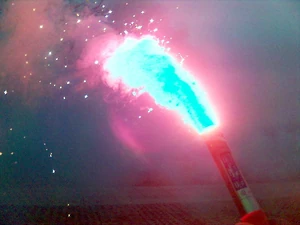 A deployed maritime distress signal flare