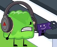 The Laser Gun in grappling hook form with a smug expression