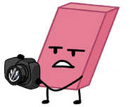 Eraser holding Camera.