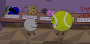 Tennis Ball and Golf Ball in the science museum of Yoyle City.PNG