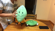 Cary holding the second prototype of the Leafy plush