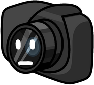 Camera with a blank expression on their face.