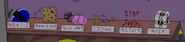 Yoylese reading "Shield" under the helmet, "Biscuit" under the cookie, "Transit" under the wall teleporter, "Memory" under the neuron, "Theft" under the blood, and "Tomb" under the Pirate Portal Cube.