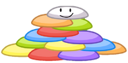 Frisbee on a stack of frisbees.