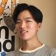 Michael next to the BFDI poster
