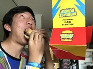 Cary eating MrBeast Burger for the first time, according to his Twitter